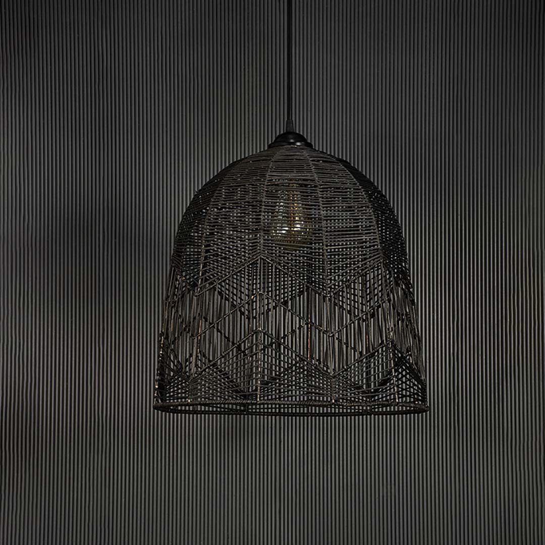Black bamboo pendant light on dark background highlighting dome weave pattern and natural matte finish.