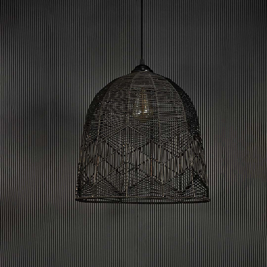 Black bamboo pendant light on dark background highlighting dome weave pattern and natural matte finish.