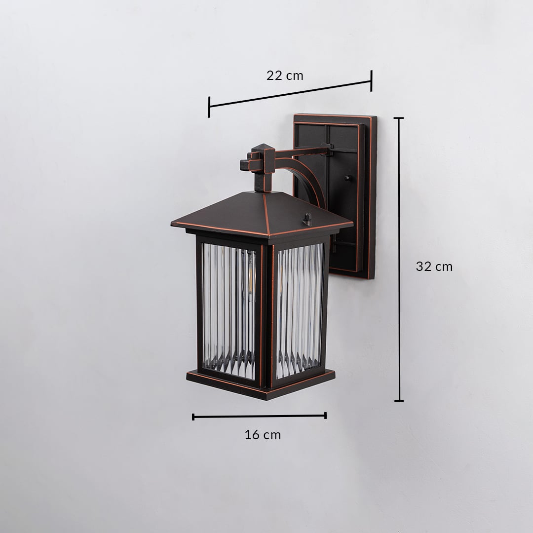 Bronze metal outdoor wall light dimension image with 32 cm height and ribbed glass shade for patio decor.