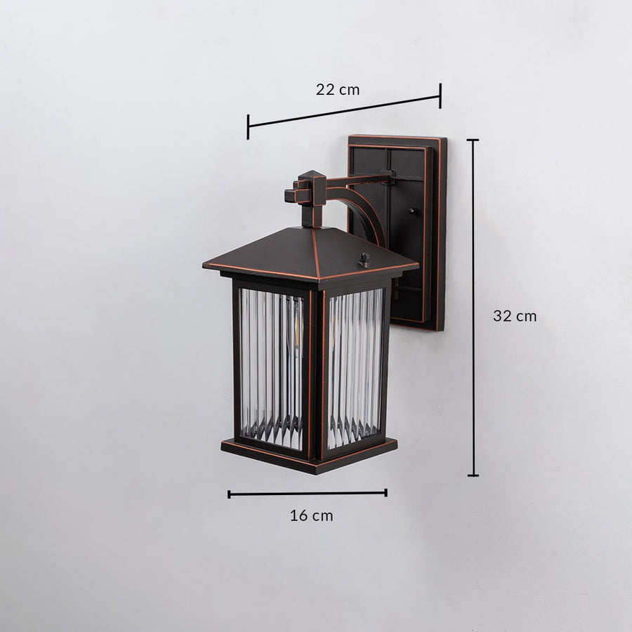 Bronze metal outdoor wall light dimension image with 32 cm height and ribbed glass shade for patio decor.