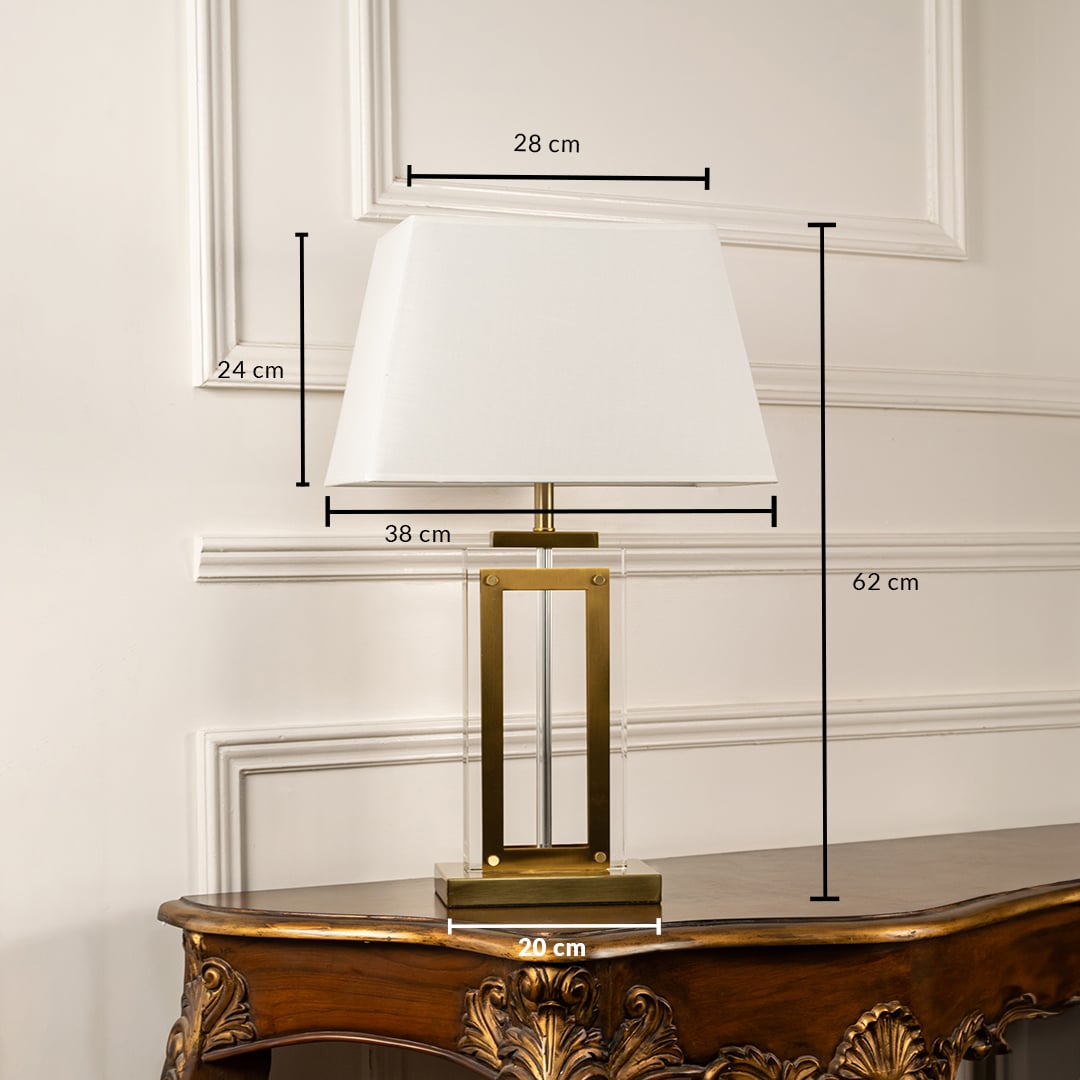 Modern gold table lamp with white shade measuring 62 cm in height and 38 cm in width featuring a sleek rectangular metal base and linen fabric shade.