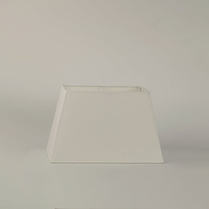 White rectangular fabric lamp shade with clean edges displayed on a plain white background for modern table lamp design.