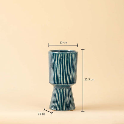 A tall blue textured vase with size markers showing a 13 cm top width 13 cm base width and 25 cm height for clear product detailing.