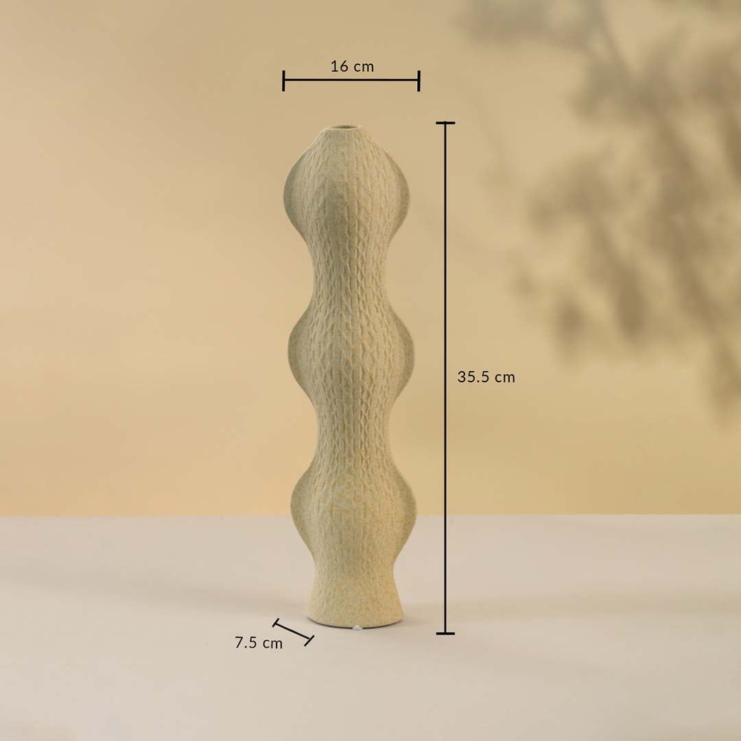 Beige ceramic vase with elegant wavy shape shown on neutral background featuring height 35 cm width 16 cm and base diameter 7 cm for accurate size reference.