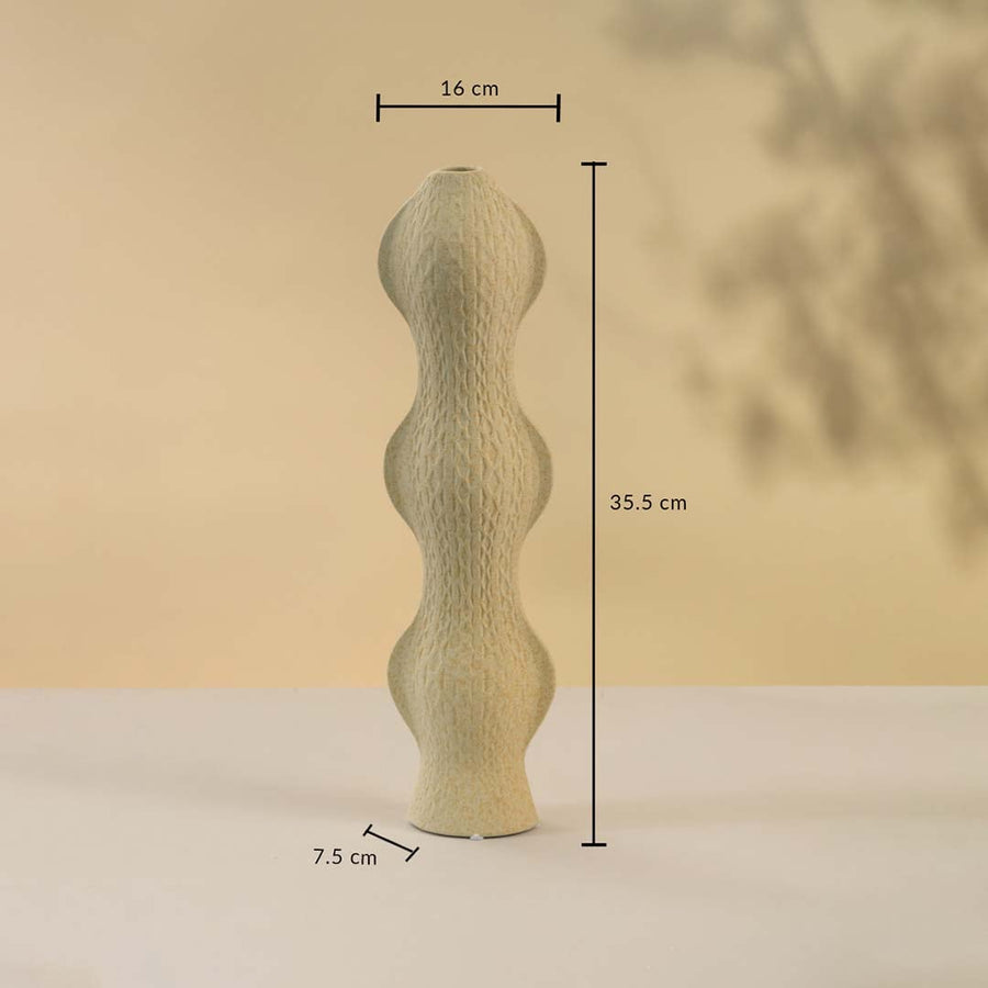 Beige ceramic vase with elegant wavy shape shown on neutral background featuring height 35 cm width 16 cm and base diameter 7 cm for accurate size reference.