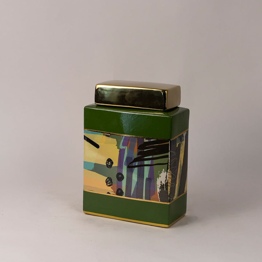Abstract ceramic jar turned slightly showing geometric brushwork and balanced proportions.