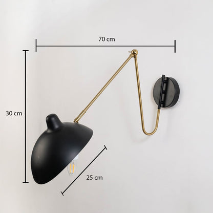 Wall light with matte black shade adjustable gold arm and black base shown with size 70 cm width 30 cm height and 25 cm depth.