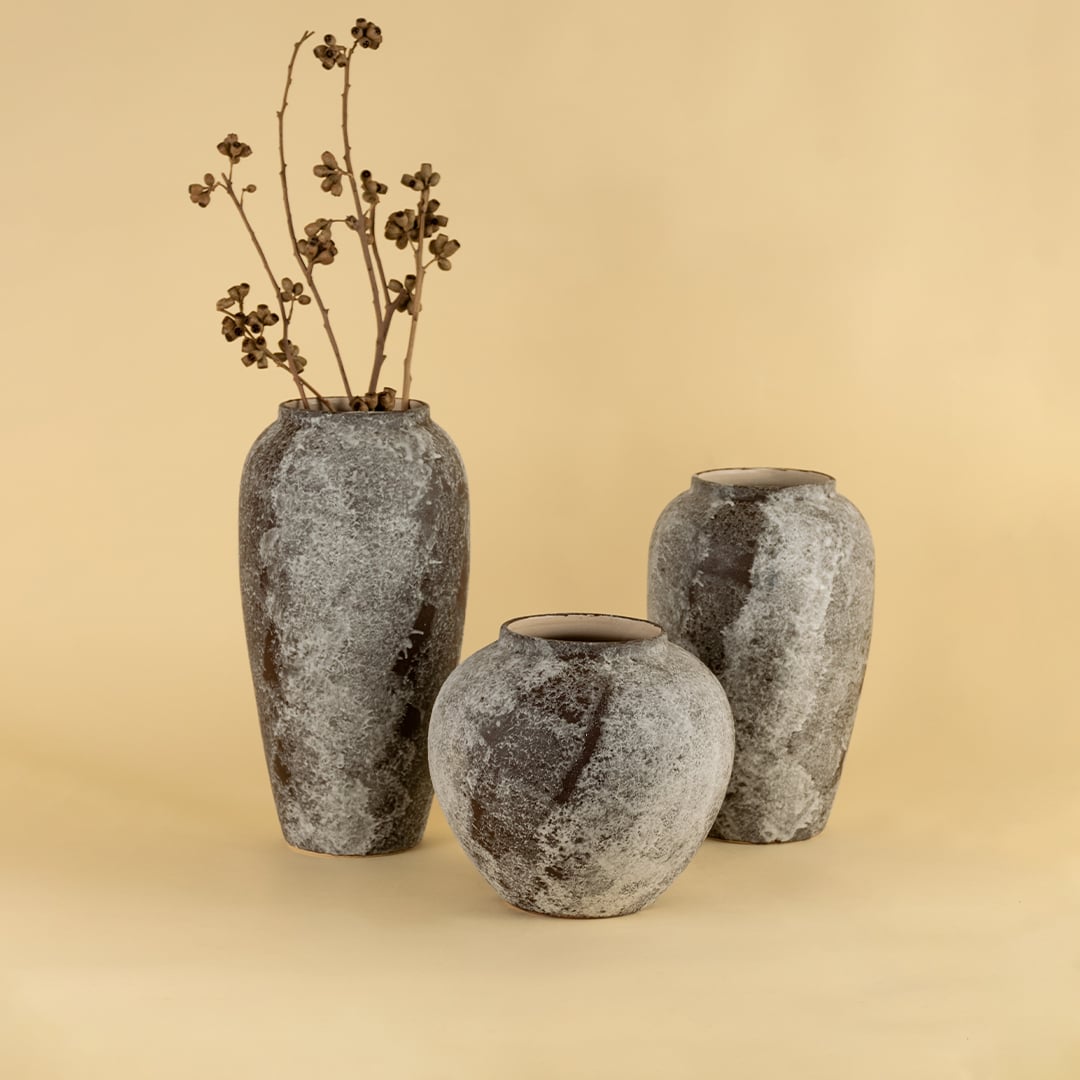 Decorative rustic ceramic vases in grey stone textured finish perfect for modern and traditional home styling.