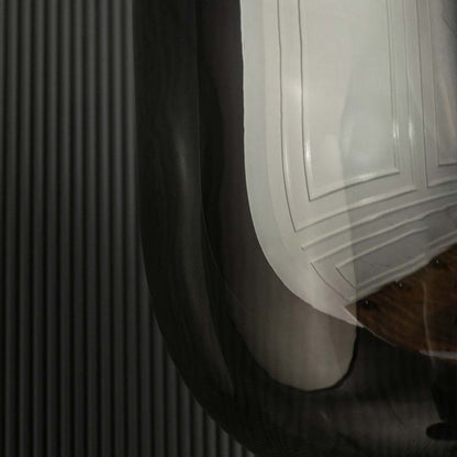 A detailed close view showing the smoked glass top section with its black metal support and modern rounded shape for stylish interior lighting.