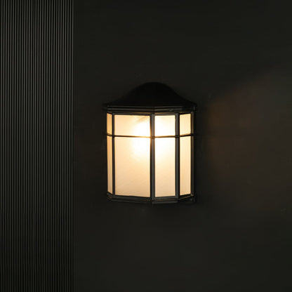 Outdoor wall light with black metal frame and frosted glass panels shown against a black background for clear visibility.