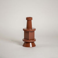 Terracotta ceramic decorative vase with sculptural stacked silhouette for shelf styling and contemporary home decor.