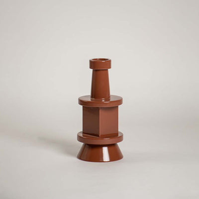 Terracotta ceramic decorative vase with sculptural stacked silhouette for shelf styling and contemporary home decor.