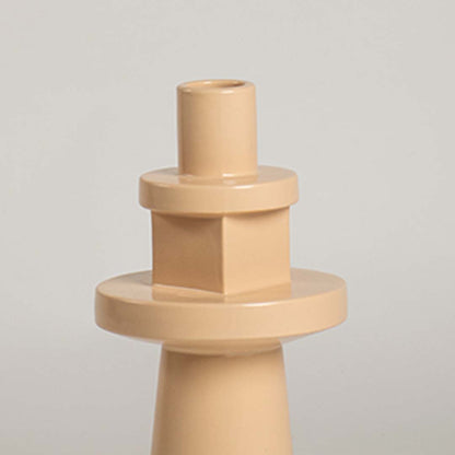 Detailed closeup view of the smooth beige ceramic glaze and stacked geometric forms on the totem vase highlighting the modern design.