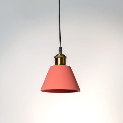 Terracotta cone pendant light turned off with elegant matte texture and golden brass detailing shown against a white background.