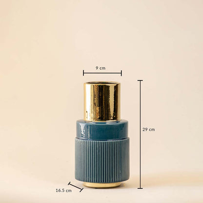Blue and gold ceramic vase shown with dimensions clearly marked at 29 cm height 16.5 cm width and 9 cm top diameter for accurate decor placement and styling.