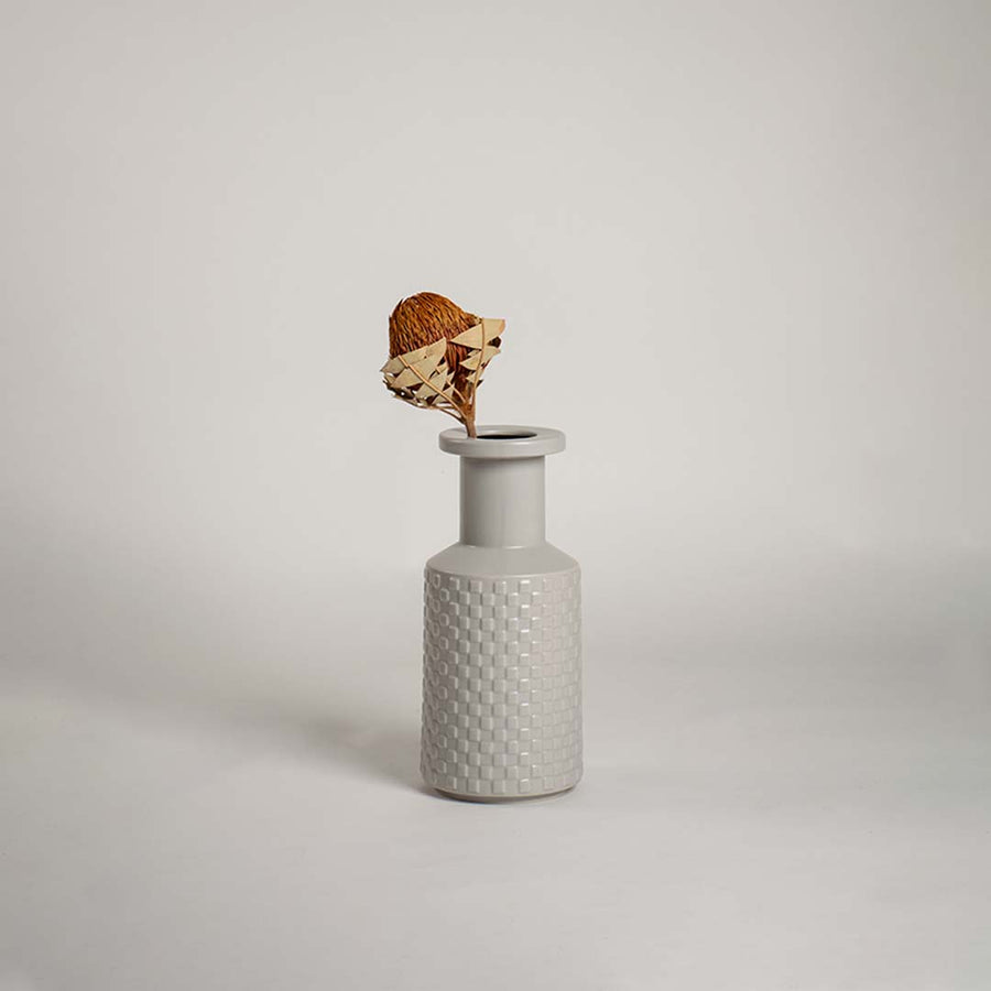 Light grey textured ceramic vase displayed on a clean white background ideal for modern home decor and minimal contemporary styling.