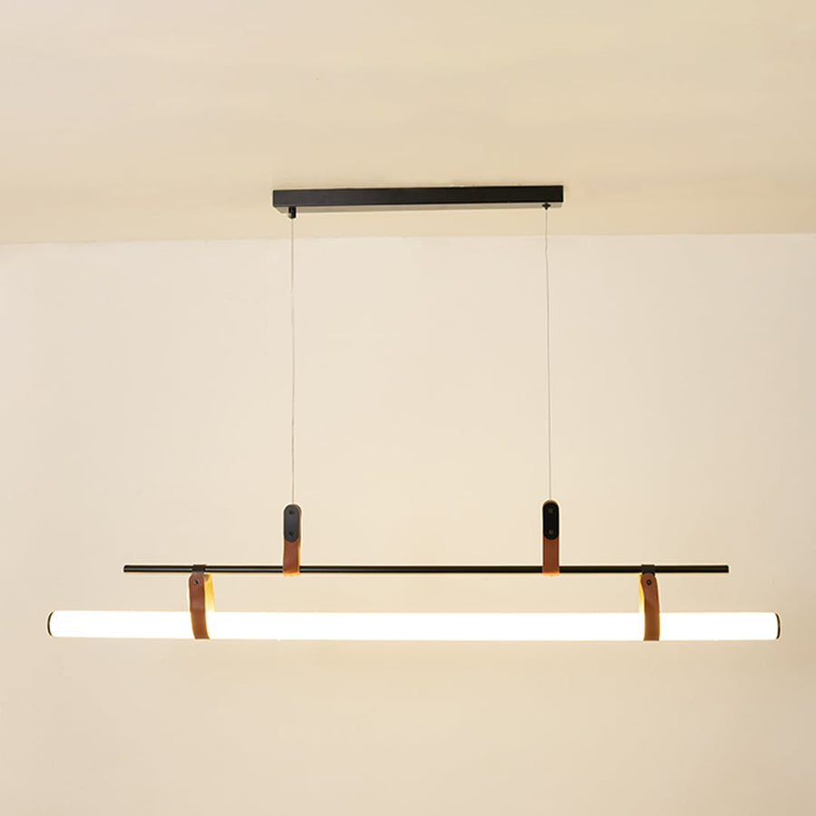 Black metal linear LED pendant light with integrated illumination creating sleek modern ambient ceiling lighting indoors.
