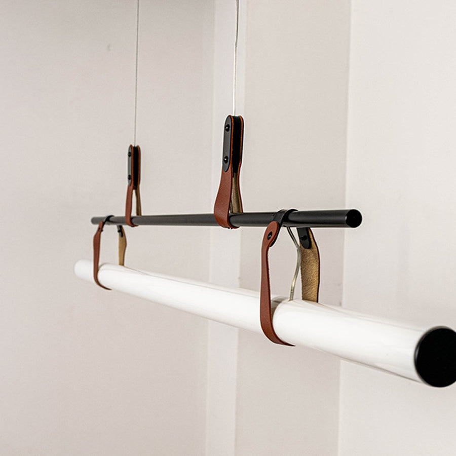 Black metal linear LED pendant light showcasing premium metal craftsmanship and frosted diffuser detailing for interiors.