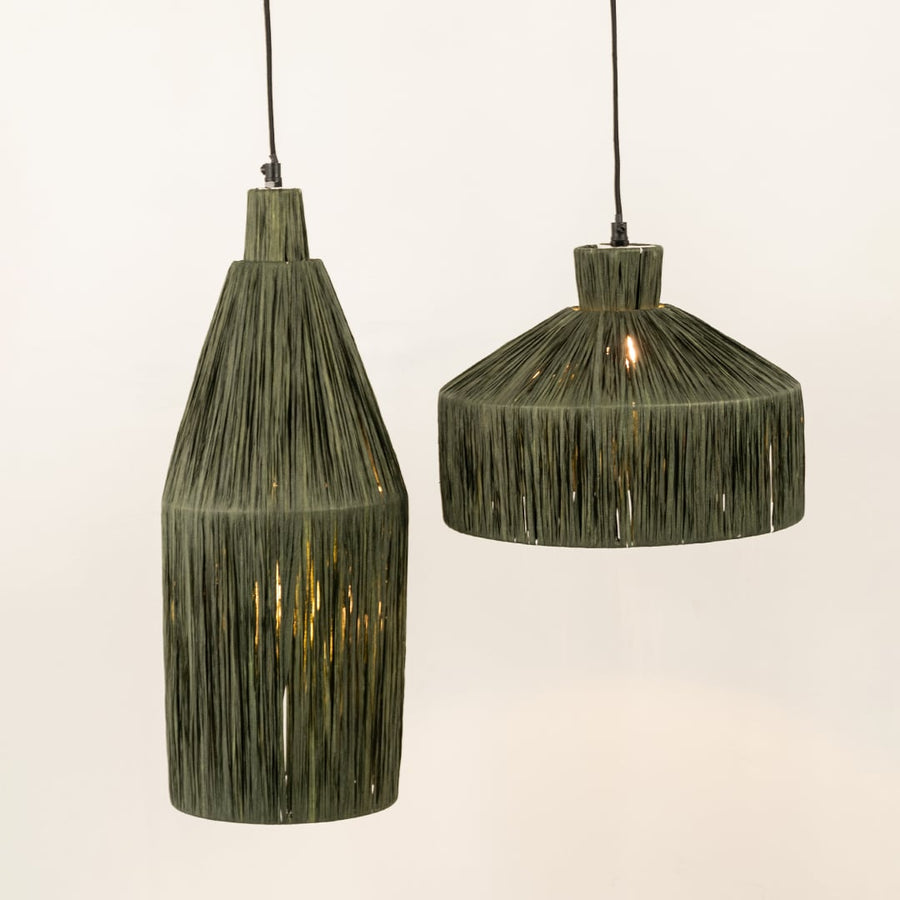 Green woven fiber pendant lights illuminated to showcase handcrafted ceiling lighting with natural organic elegance.