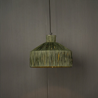 Green woven pendant light with a geometric shape glowing softly and adding a natural textured highlight that brings a handcrafted touch to the space.