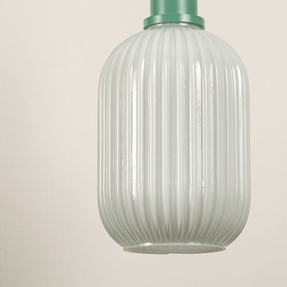 White ribbed glass pendant light with mint green top displayed on white background for modern decor.