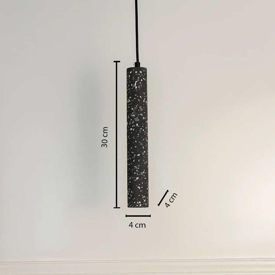 Amber glass pendant light measuring 26 cm wide and 32 cm tall featuring a brass mount and sleek glass body.