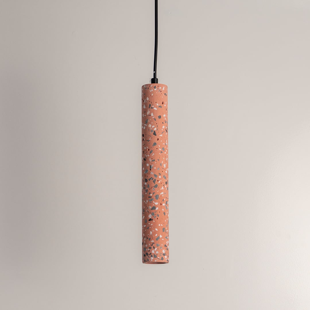 Terracotta terrazzo pendant light with black speckles crafted for modern living and dining spaces.
