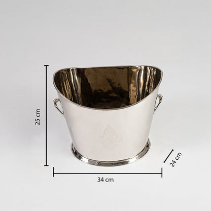 Brass floral planter with handles placed on white surface with size details marked as 45x25x5 cm.