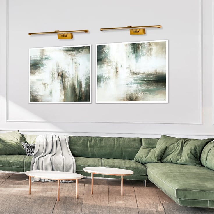 Elegant gold picture light enhancing wall decor with warm illumination ideal for living room or gallery spaces.