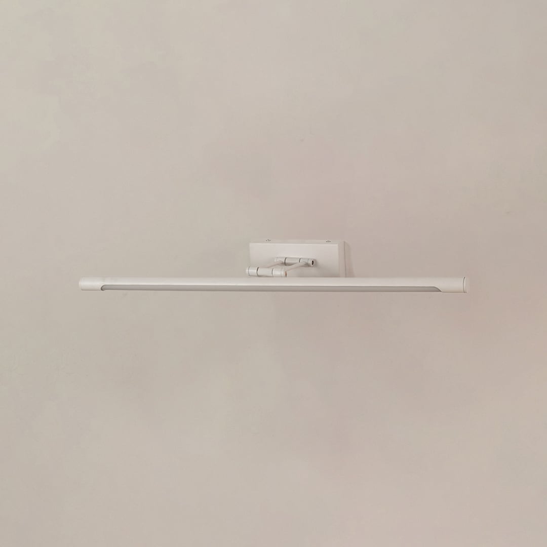White metal picture light displayed on a white background with the light off showing its minimal design.