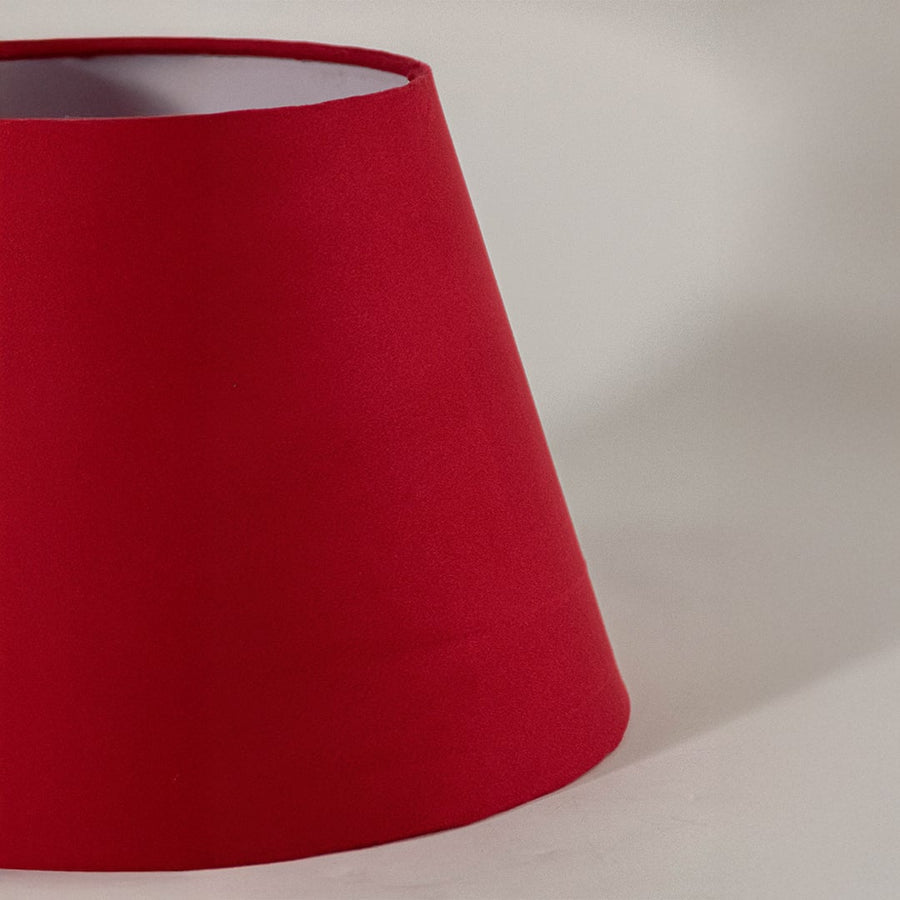 Closeup view of the red tapered lampshade showing its rich fabric texture and neat finish for a clear and detailed product presentation.