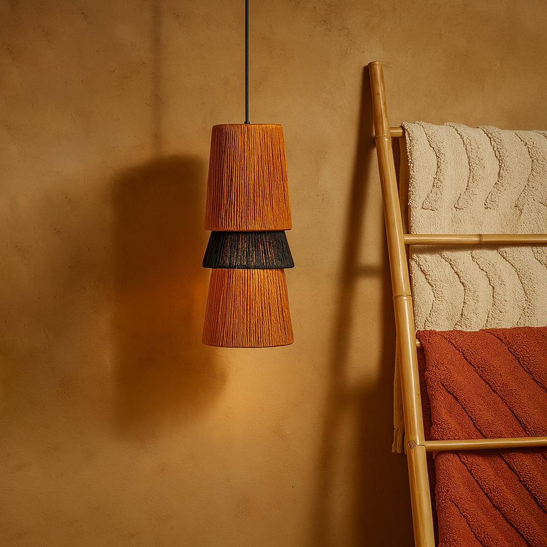 Natural fiber wall light mounted beside wooden ladder adding warm organic lighting to rustic interior decor.