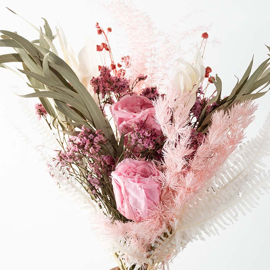 Closeup of rose blush dried flower bouquet highlighting soft petals preserved texture and elegant tones ideal for gifting and home decor use.