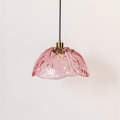 Pink textured glass and gold metal pendant light designed for elegant dining room and kitchen decor interiors.