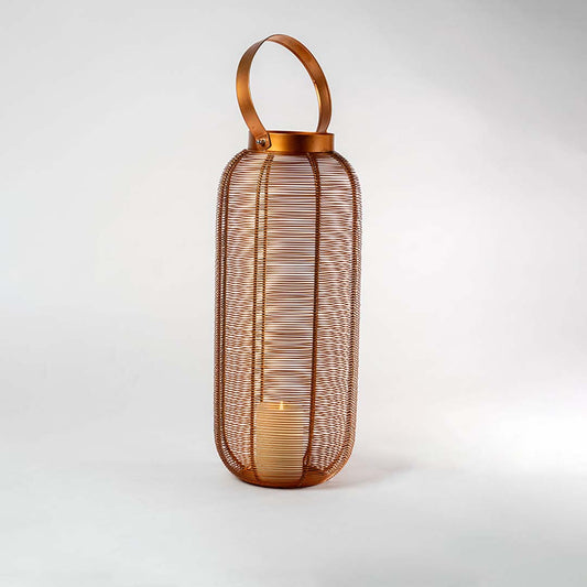 Decorative copper metal mesh lantern with open frame design for luxury tabletop decor styling.