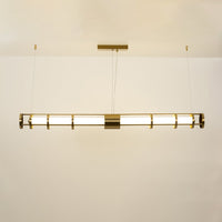 Sleek gold linear glass bar pendant providing premium LED illumination with a geometric contemporary form ideal for dining rooms and kitchen island lighting.