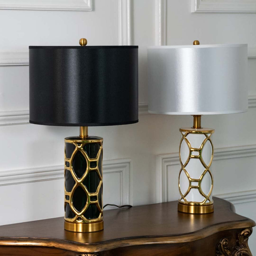 Collection of elegant black and gold ceramic table lamps styled for modern living room and bedroom interiors.