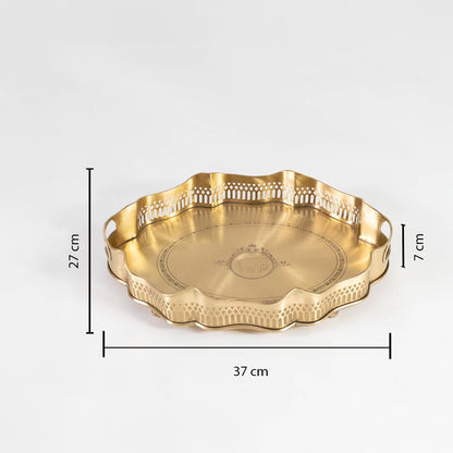 Brass tray with 37 cm width 29 cm depth and 7 cm height shown with cutout border and engraved design on white.