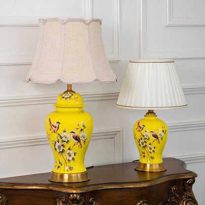 Astra crystal lamps with pleated white shades and gold bases grouped together with light turned off for modern decorative styling.