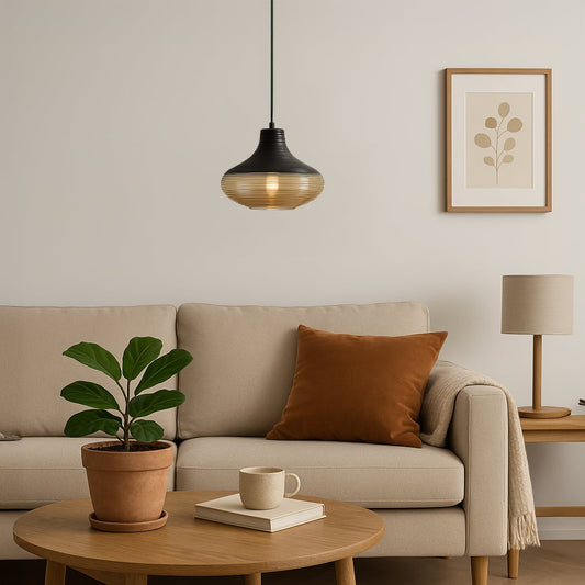 Red glass pendant lamp glowing warmly above dining table creating bold and elegant ambience in modern interiors.