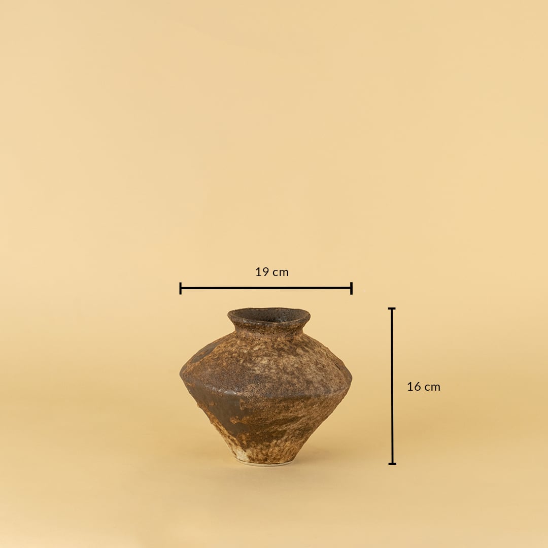 Rustic brown ceramic vase with handcrafted texture shown with 16 cm height and 19 cm width for size reference.