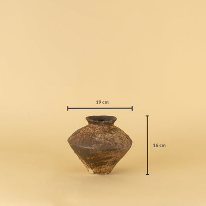Rustic brown ceramic vase with handcrafted texture shown with 16 cm height and 19 cm width for size reference.