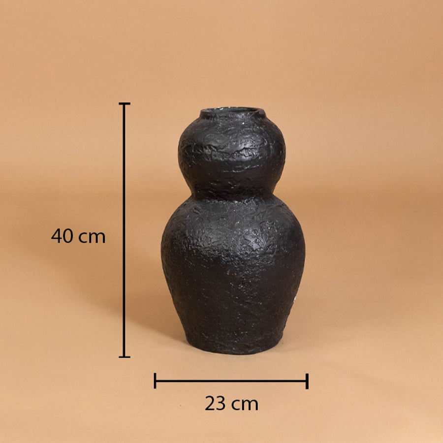 Black textured decorative vase shown with 40 cm height and 23 cm width for accurate placement in modern home interior decor settings.
