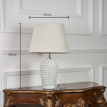 Ceramic table lamp measuring 68 cm height with a 38 cm wide shade and 38 cm base diameter displayed with clear markings on a white backdrop.