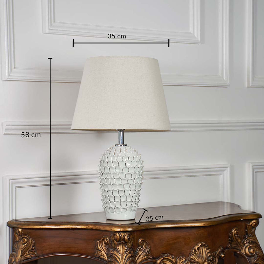 Ceramic table lamp measuring 68 cm height with a 38 cm wide shade and 38 cm base diameter displayed with clear markings on a white backdrop.