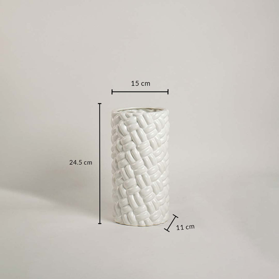 A textured white vase shown with measurements 24.5 cm height 15 cm width and 11 cm base providing clear dimension details for buyers.