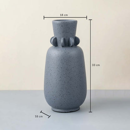 Grey ceramic vase with speckled design 33 cm height and 18 cm width ideal for table decor and home styling.