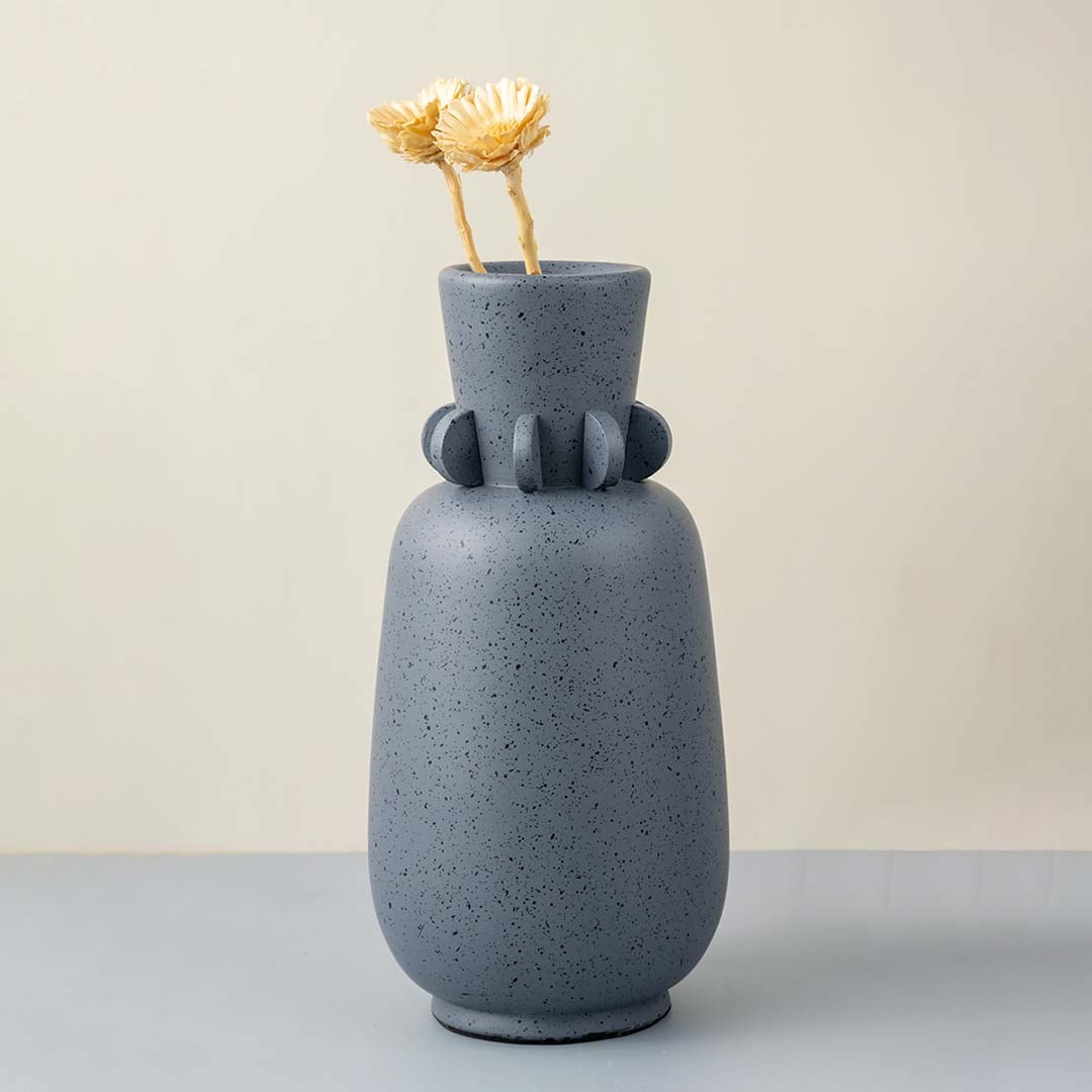 Sasa sculpture vase on white background featuring artistic ceramic form smooth surface and statement design for modern interior decor styling.