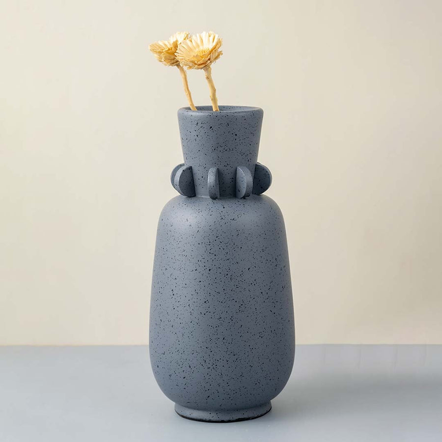 Sasa sculpture vase on white background featuring artistic ceramic form smooth surface and statement design for modern interior decor styling.