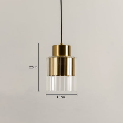 Pendant light measuring 22 cm in height and 15 cm in width featuring a metal top and clear ribbed glass base.